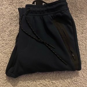 Dark blue American eagle sweatpants in medium